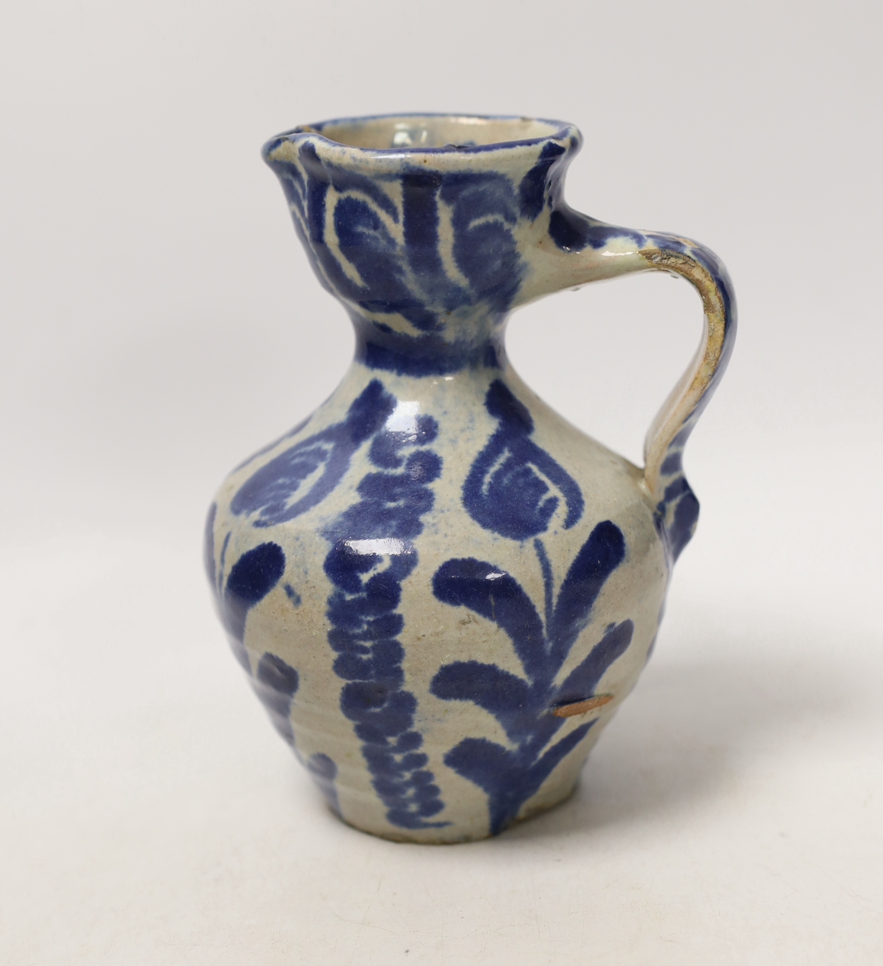 An 18th century Spanish maiolica jug, Grenada, 17cm